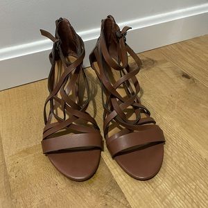 Brown low wedge strapping sandals